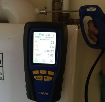 Boiler servicing using Anton flue gas analyser to check carbon monoxide levels