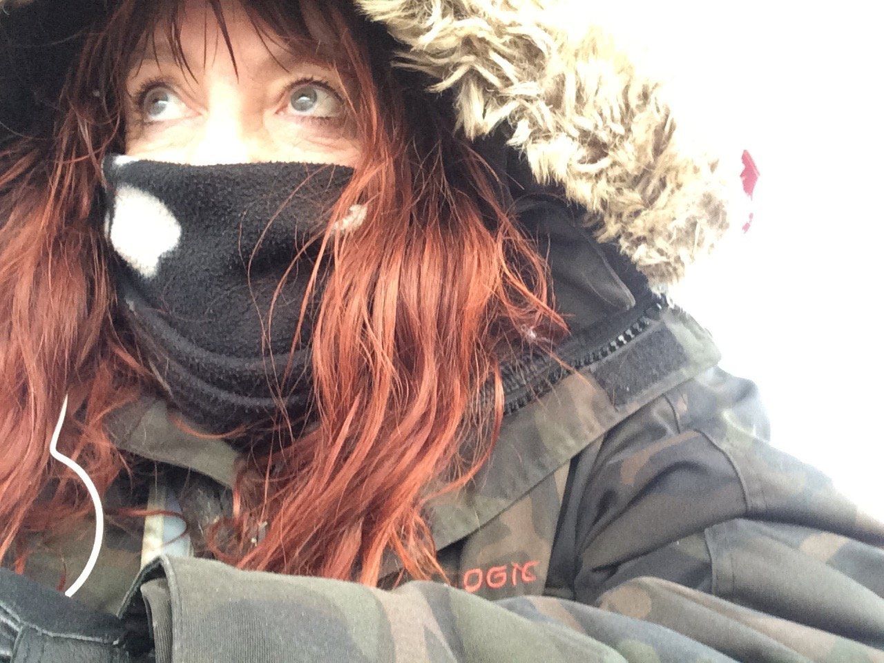 Red-head wrapped up warm