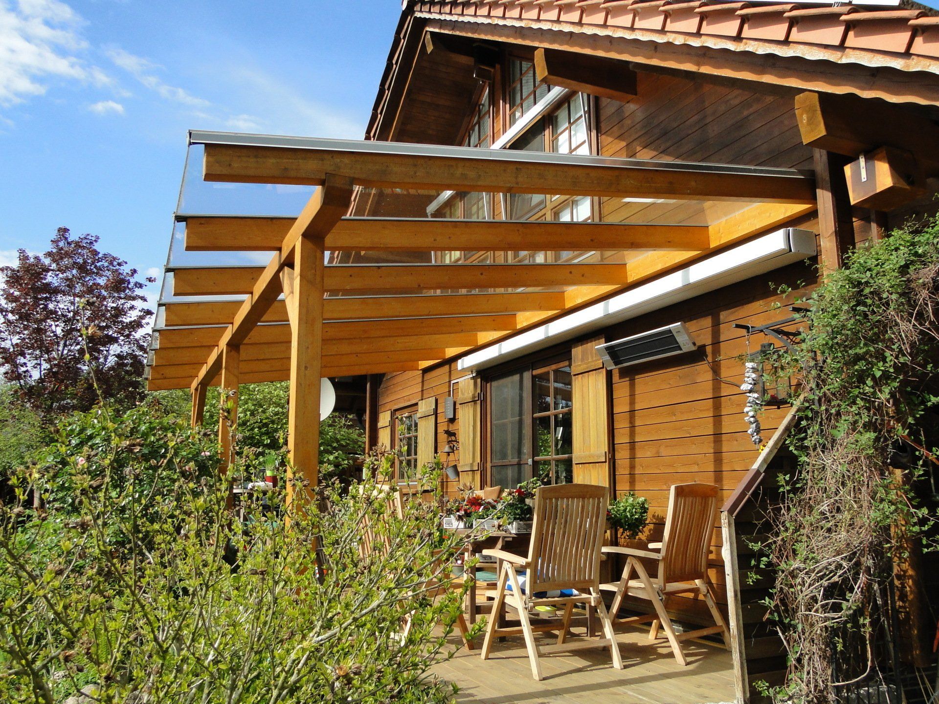 Terrassendaecher/ Terrassenueberdachungen aus Holz