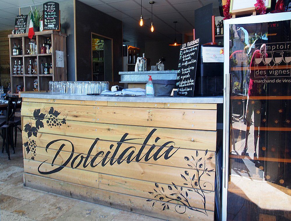 dolcitalia écrit  sur un mur