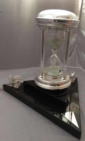 After - commissioned time piece which is mounted on a granite base