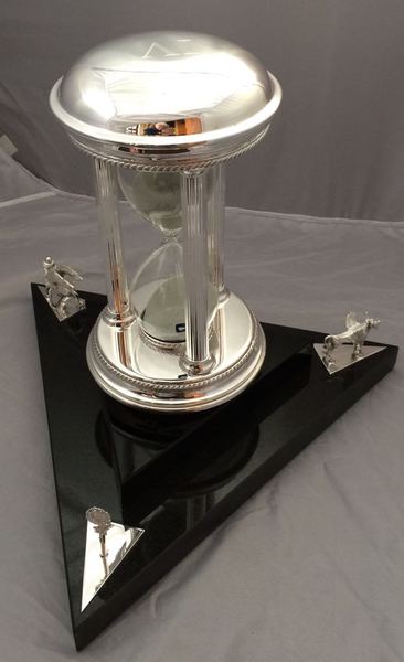 After - commissioned time piece which is mounted on a granite base