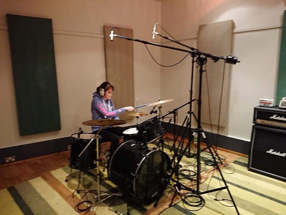 Lauren on drums in recording studio