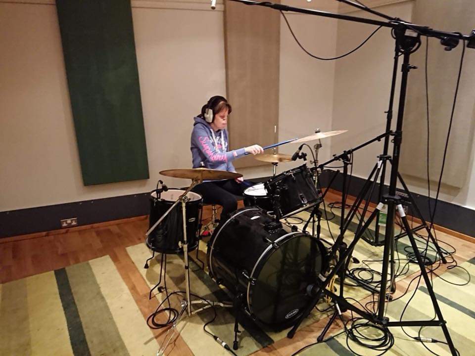 in recording studio Lauren on drums