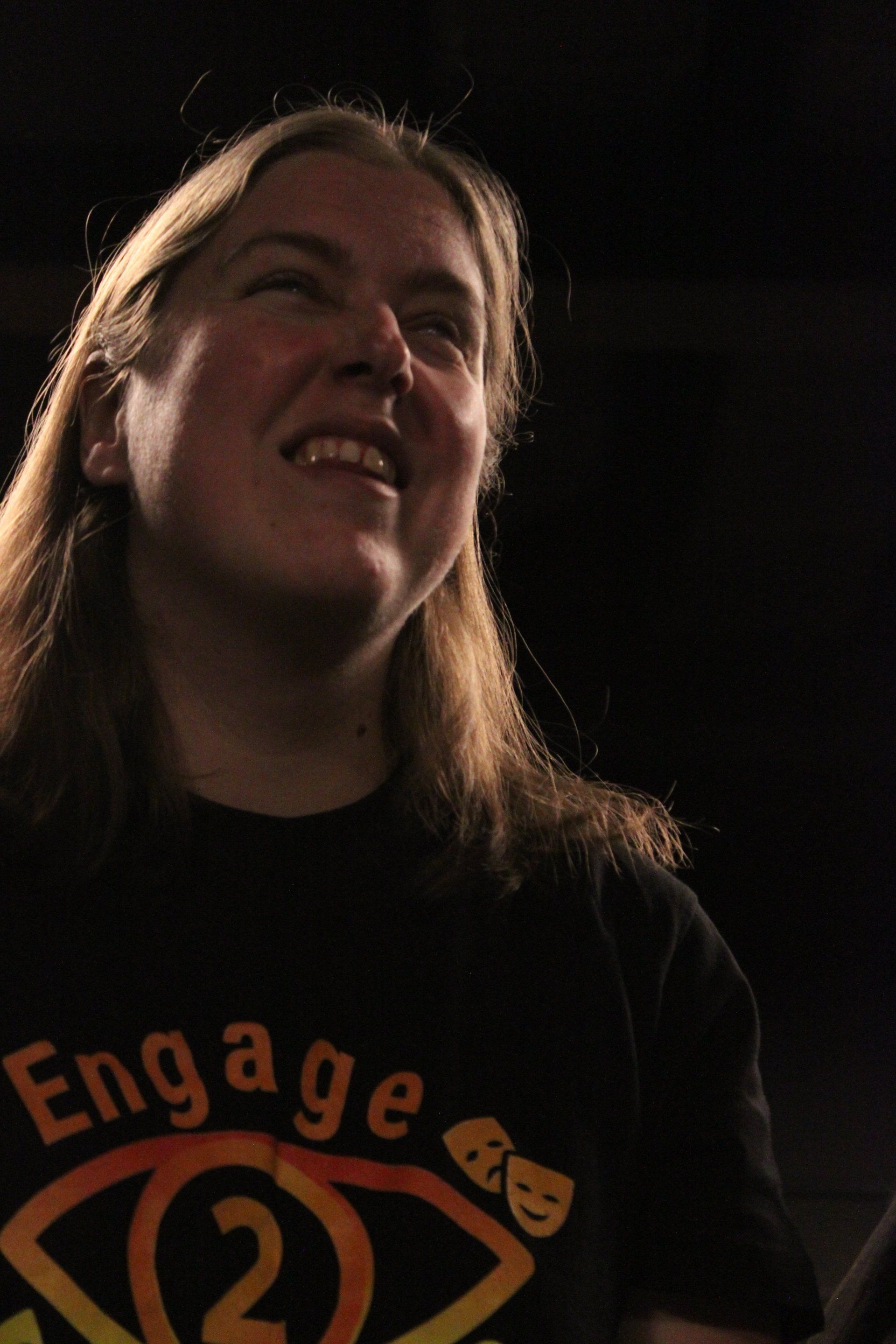 Alex smiling light highlighting face