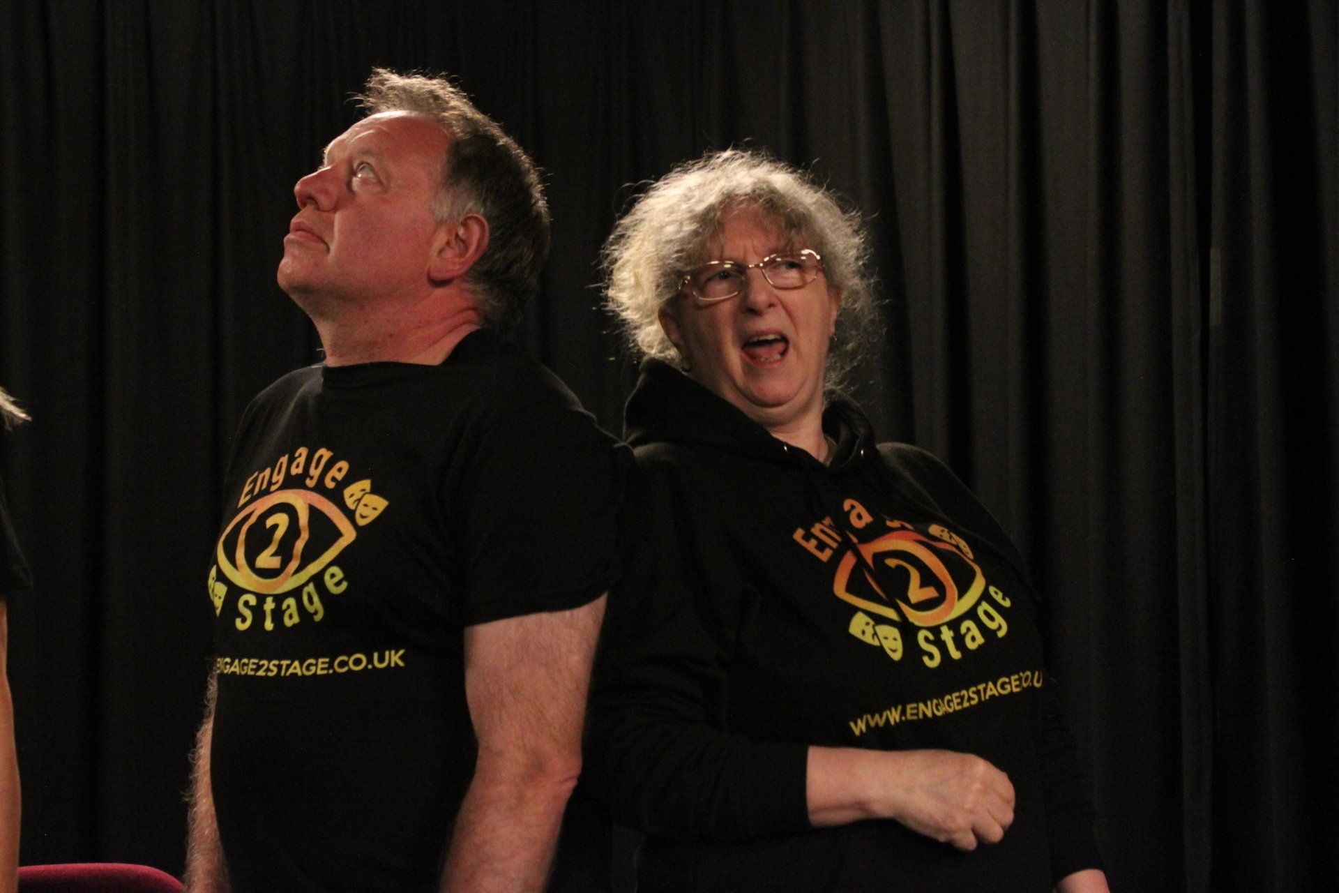 Michael and Mags stood back to back in studio