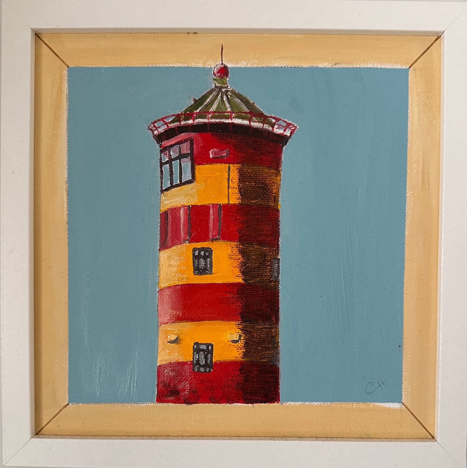 Gerahmtes Gemälde eines rot-gelb gestreiften Leuchtturms vor blauem Himmel.