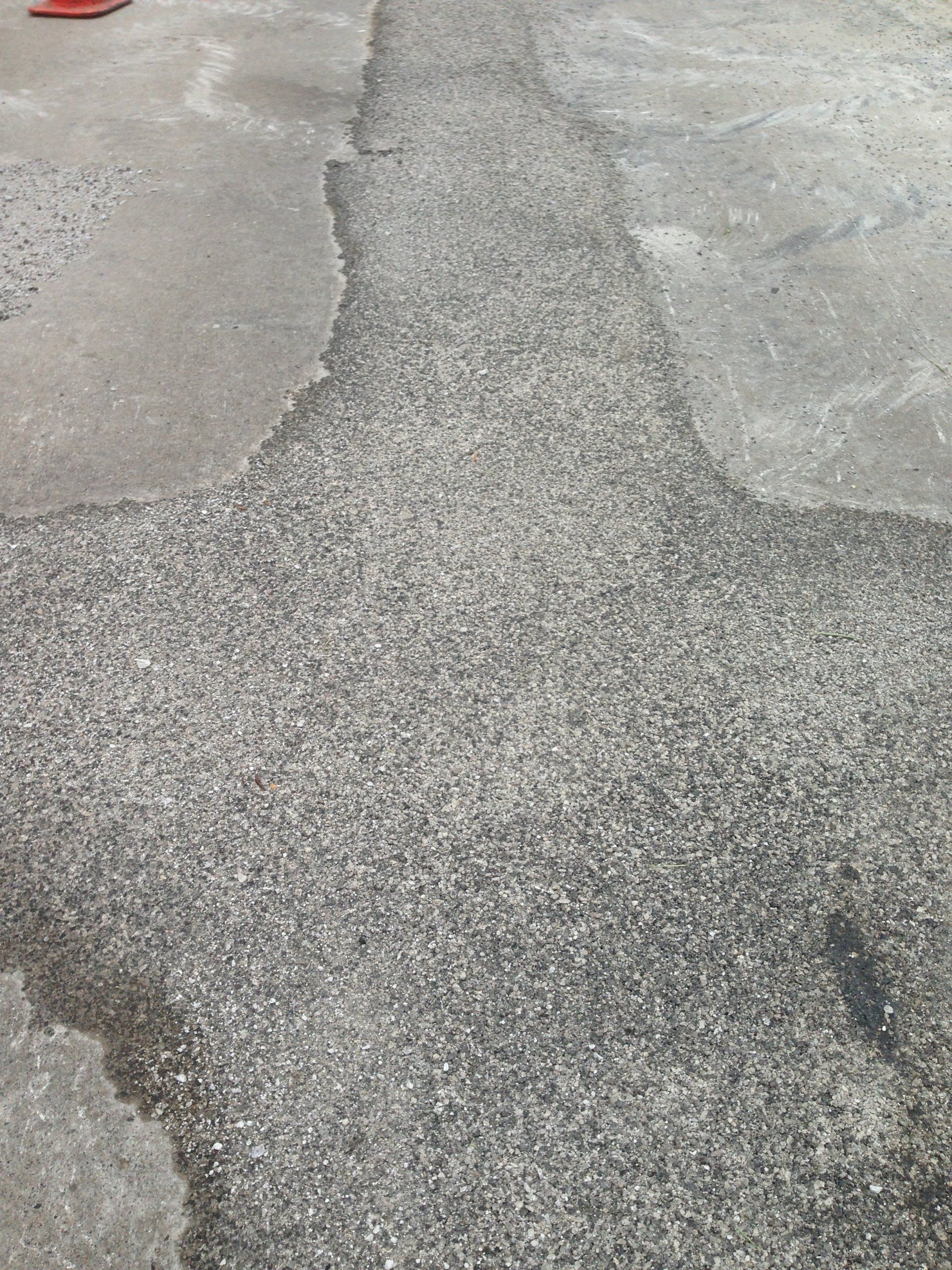 Spray Patch Road Repair Fixing Michigan's Roads