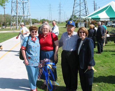 people watching the ribbon cutting ceremony