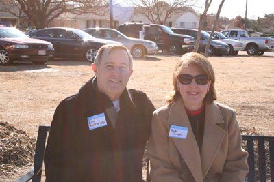 Current Dallas City Councilmember Ron Natinsky and Honoree Sandy Greyson, sitting on the new bench.