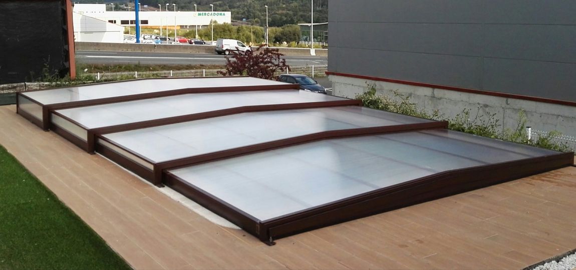 Cubiertas de piscinas, cubiertas rígidas transitables