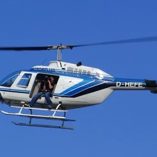 pictures in motion Kameramann im Helicopter