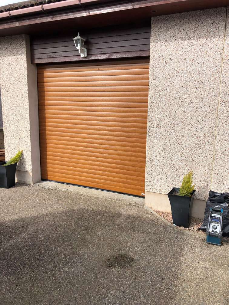 Domestic roller garage door