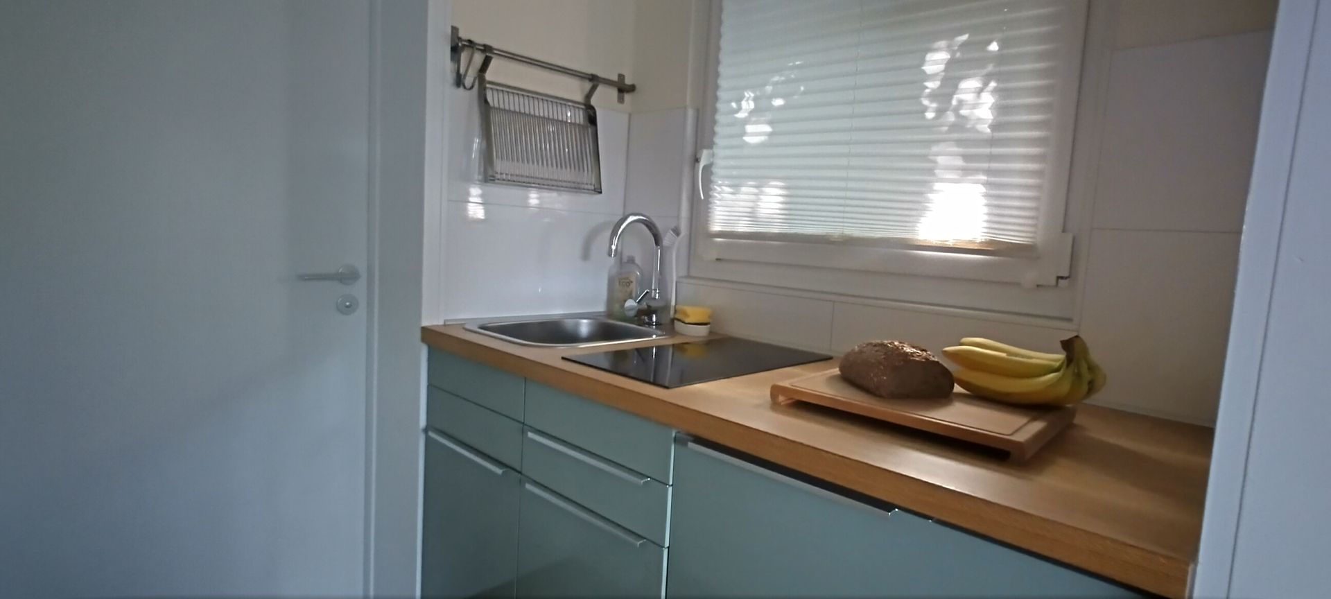 Moderne kleine Küche - vollständig ausgestattet für Ihren Urlaub.