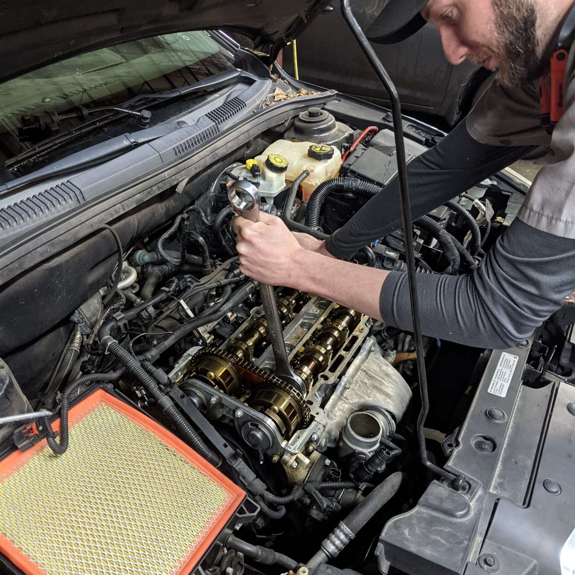 Working on an engine repair