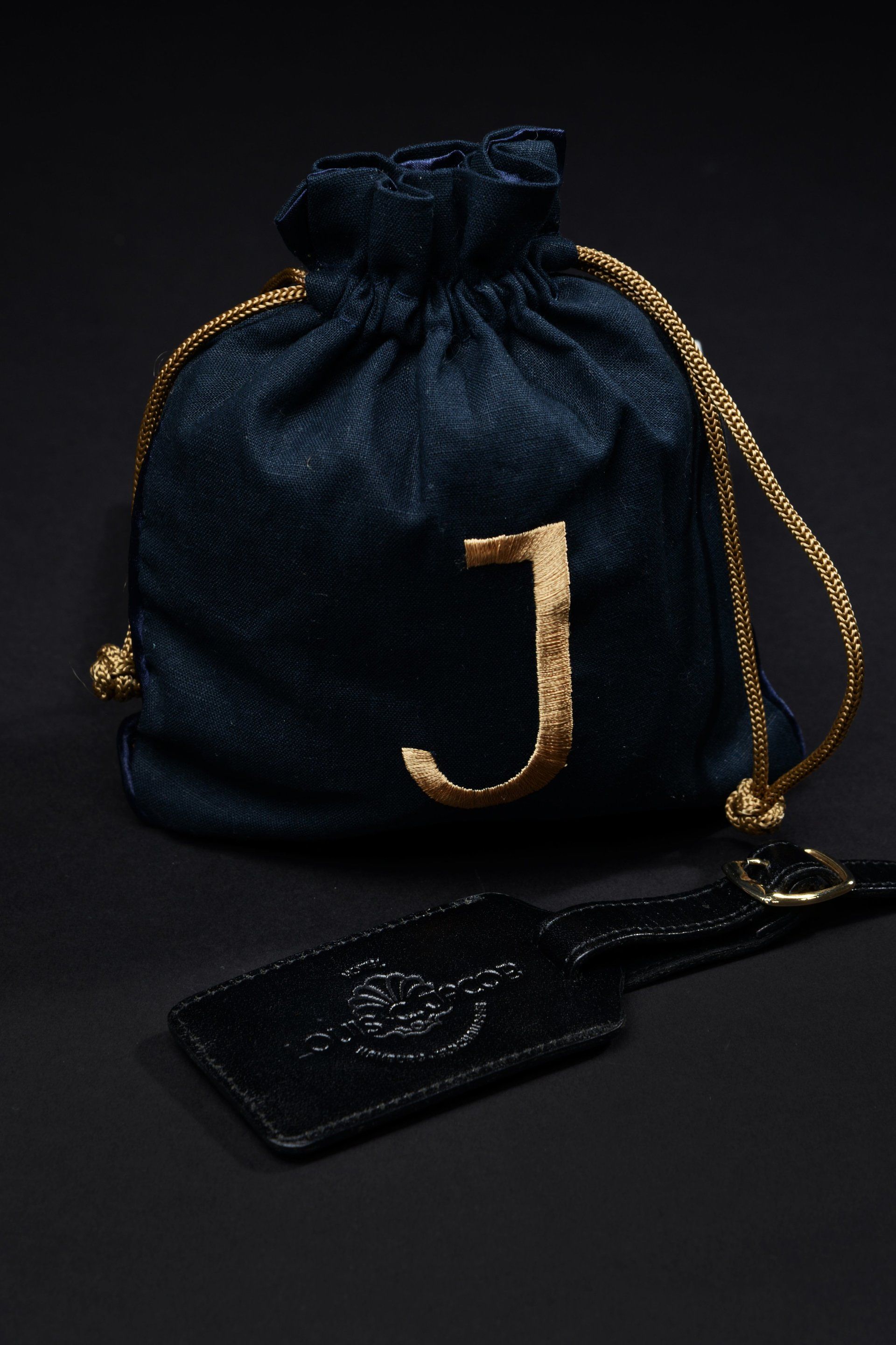 Kofferanhänger aus Leder schwarz Werbegeschenk handgemacht