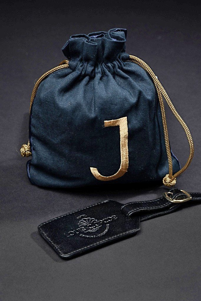 Kofferanhänger aus Leder schwarz Werbegeschenk handgemacht