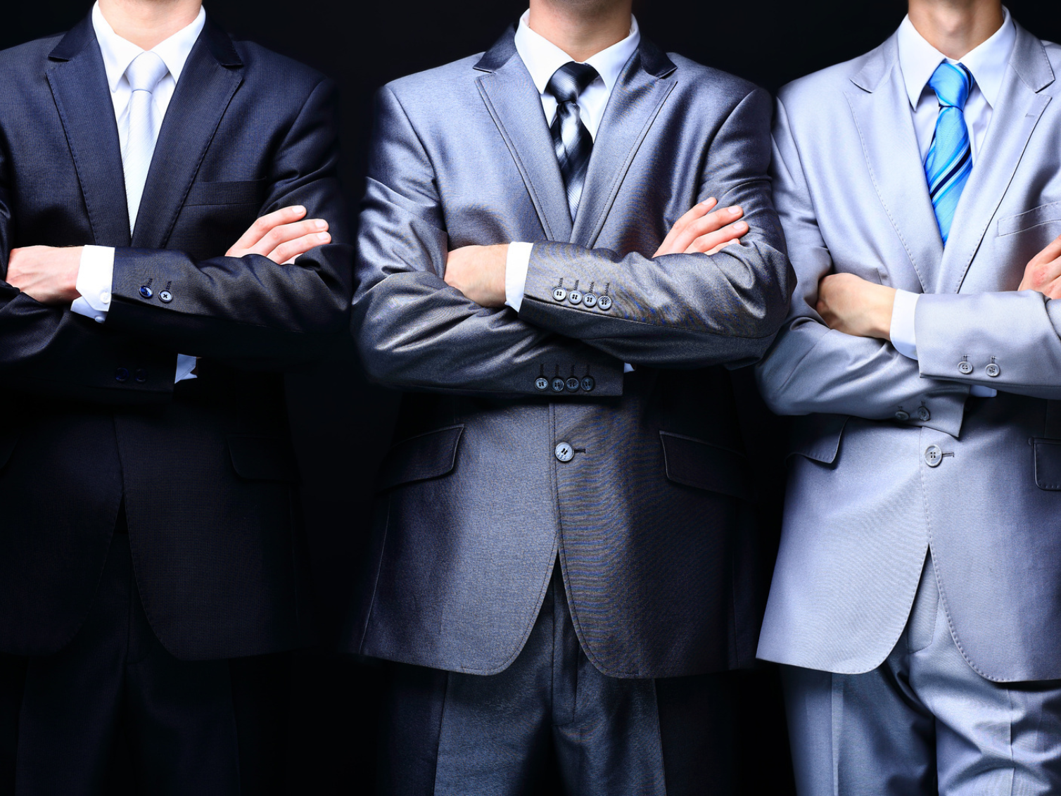 Executives - Drei Maenner im Anzug
