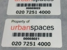 Asset label with barcodes and custom printed company logo
