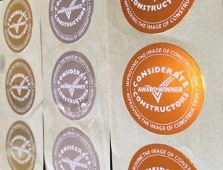 Gold Silver and Bronze foil labels on a roll