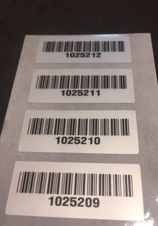 Barcode Labels on a roll with custom printed data
