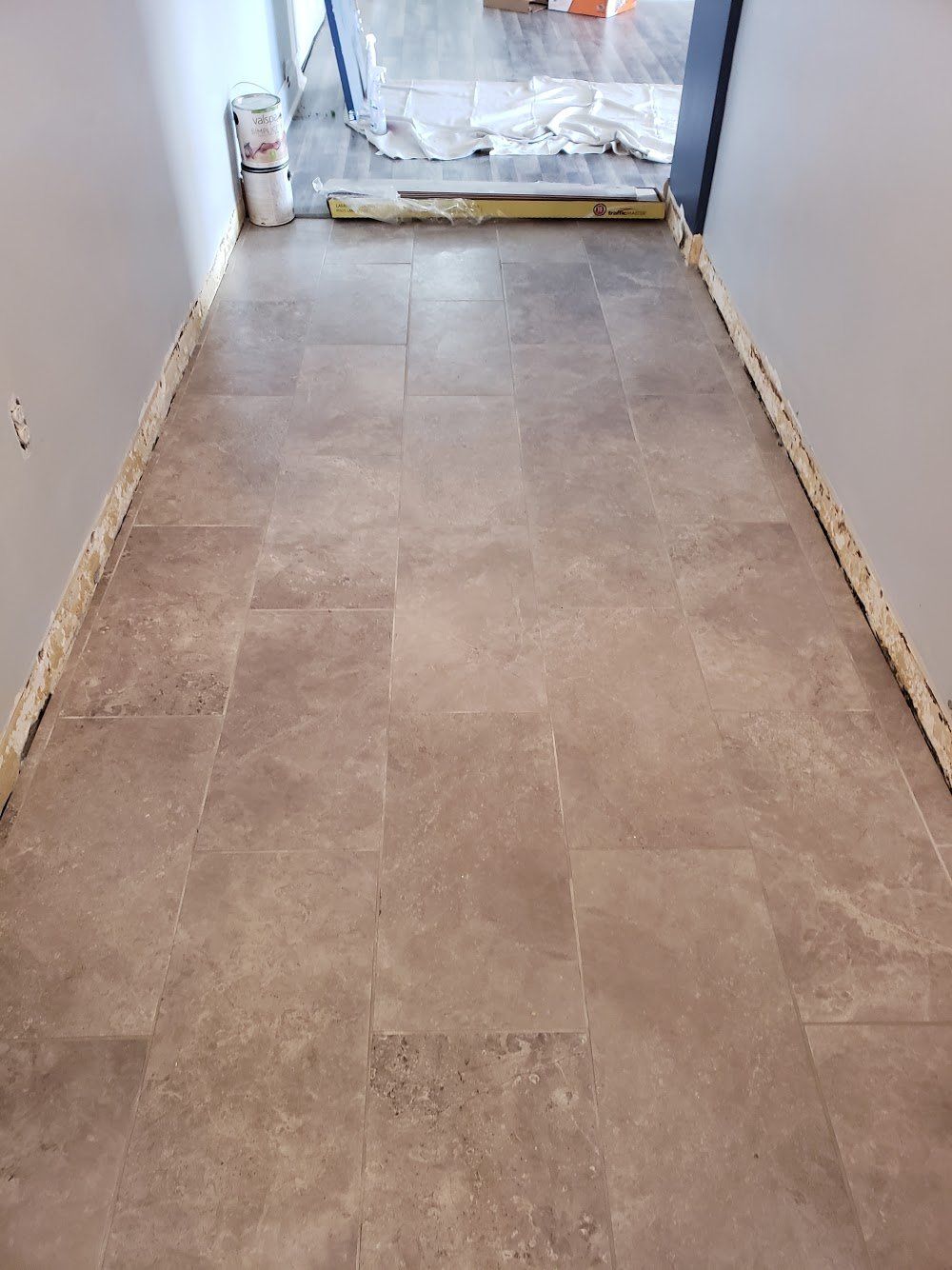 In progress photo - Hallway entry way with new large format ceramic tile in Elkins Park tile flooring installation