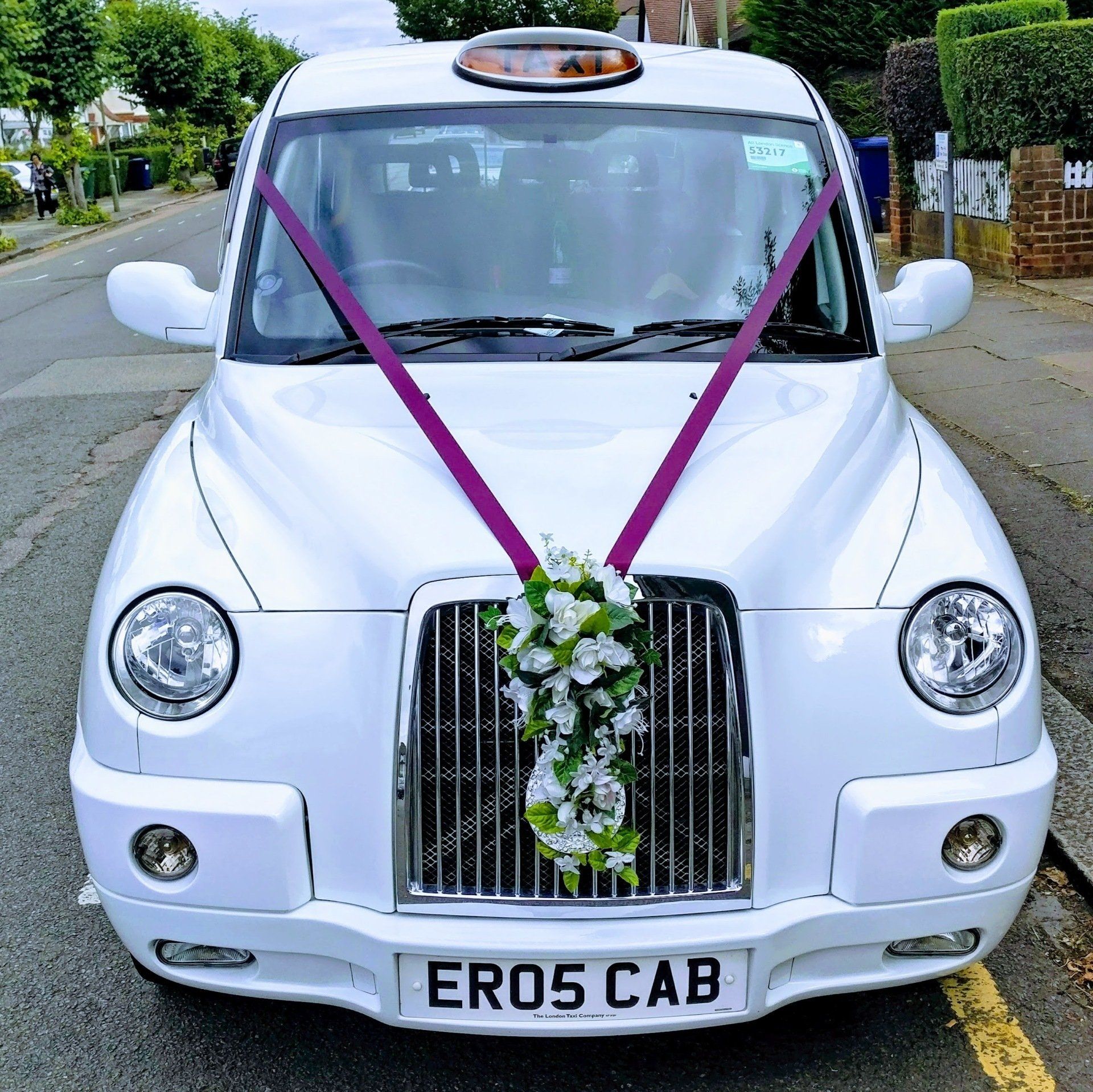 White Wedding Taxi with Burgundy Wedding Ribbon