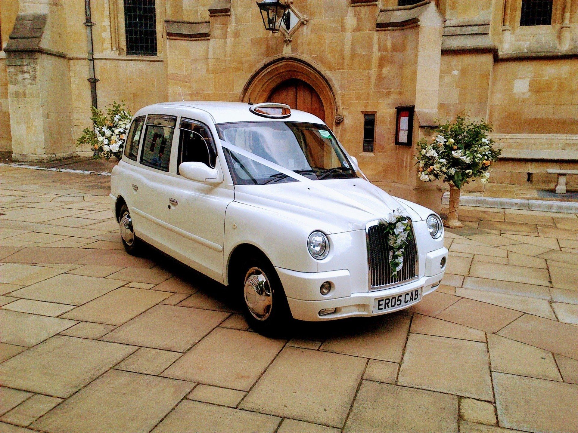 Classic White Wedding Taxis. Classic White TX4 London Wedding Taxis