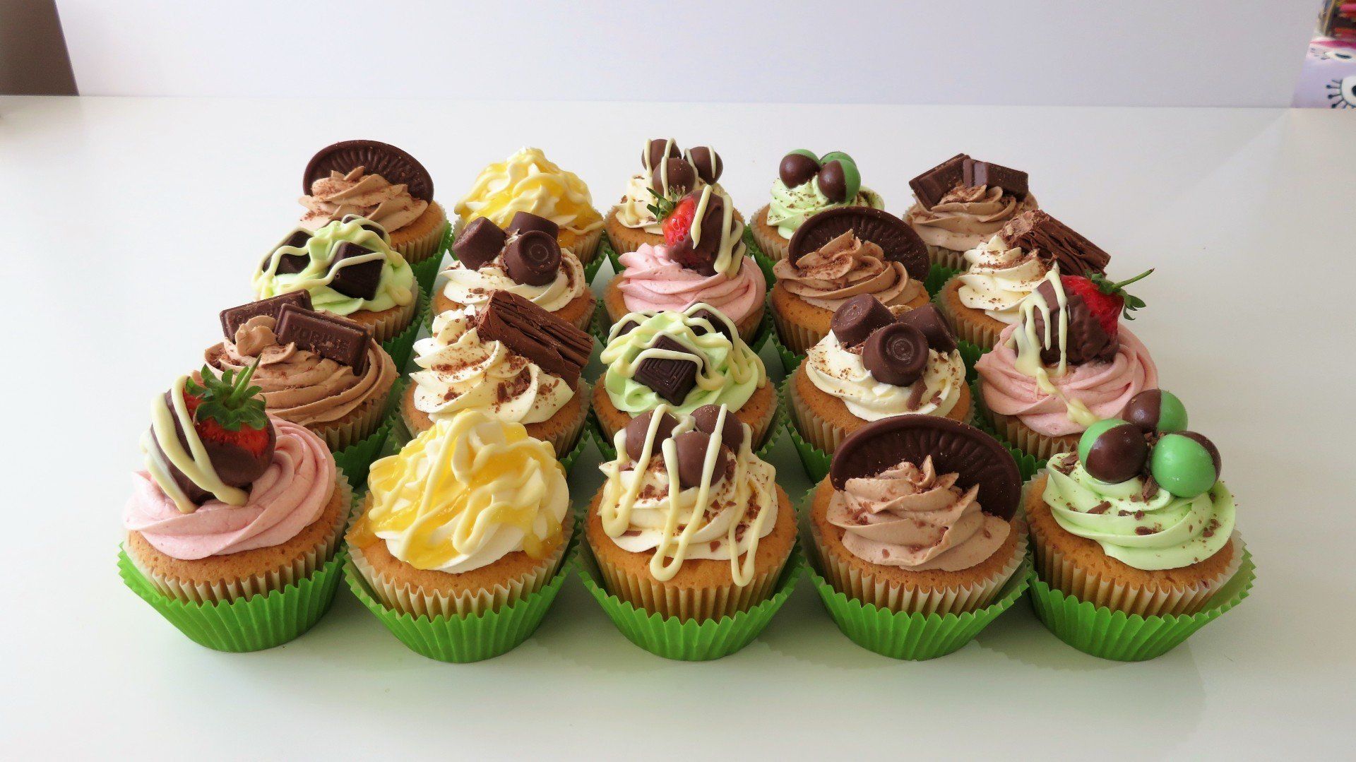 Box 12 buttercream and  variety topped cupcakes £30