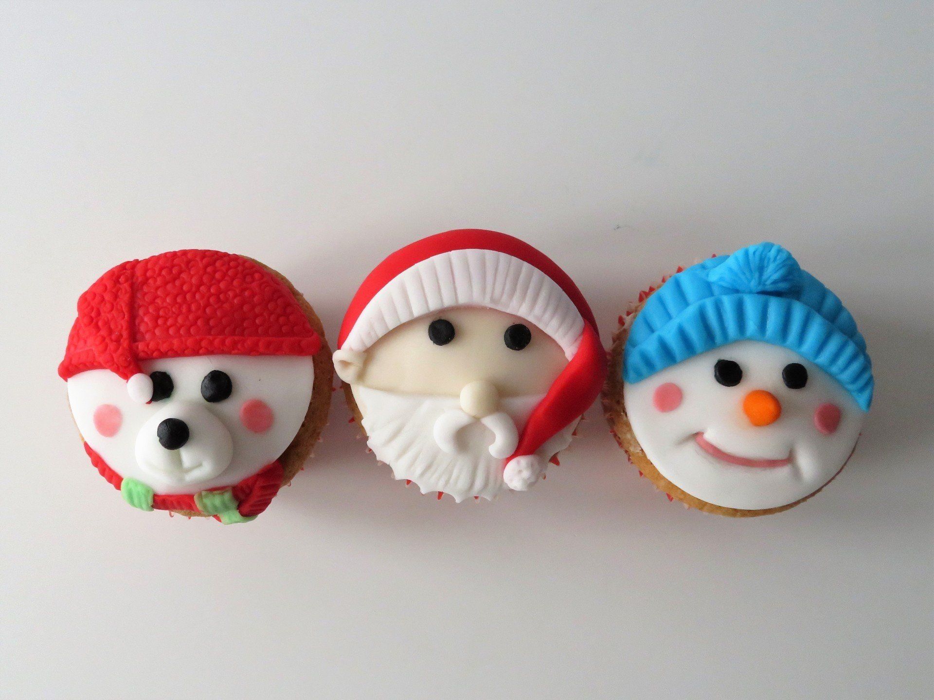 Snowman Santa and polar bear childrens  cupcakes
