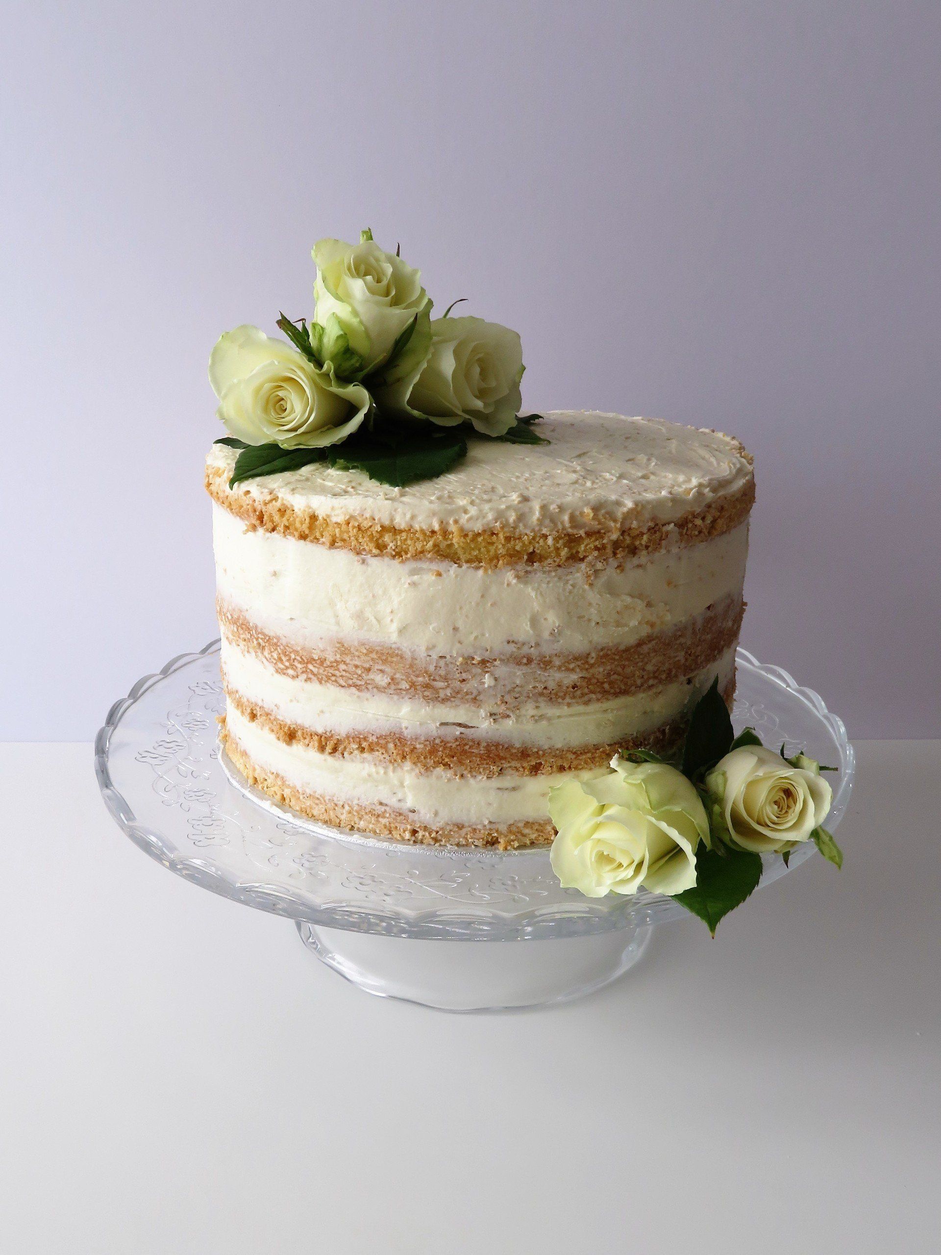 4 layer naked cake with side flower decoration