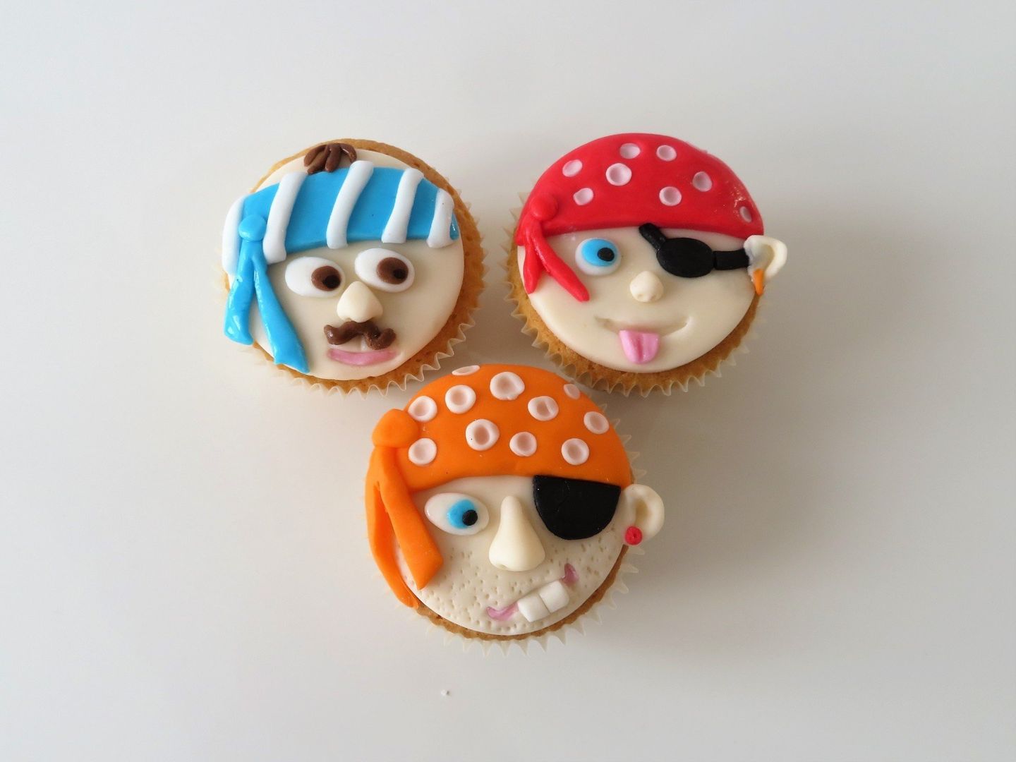 Novelty fondant covered pirate face cupcakes