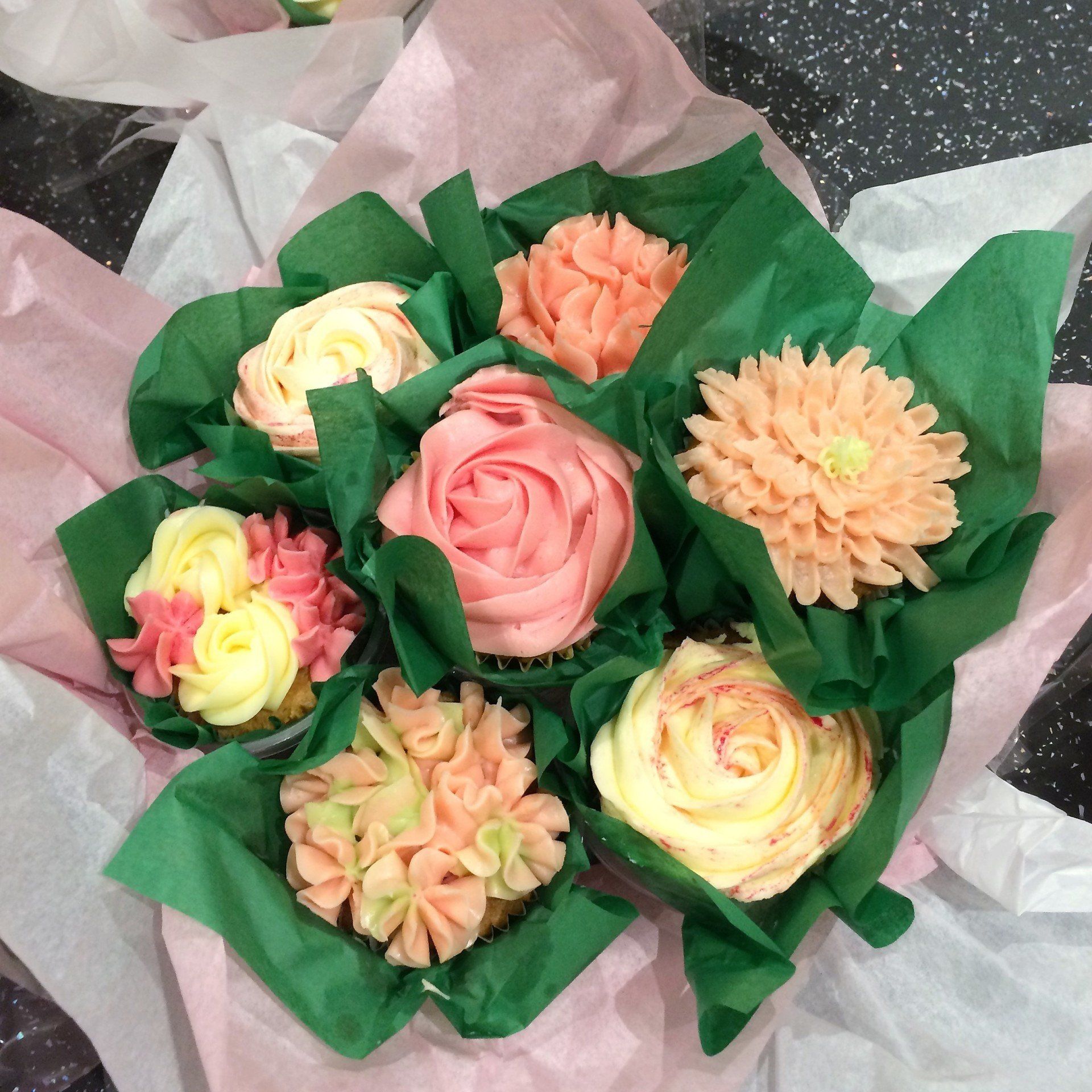 7 cupcake bouquet in for different flower designs