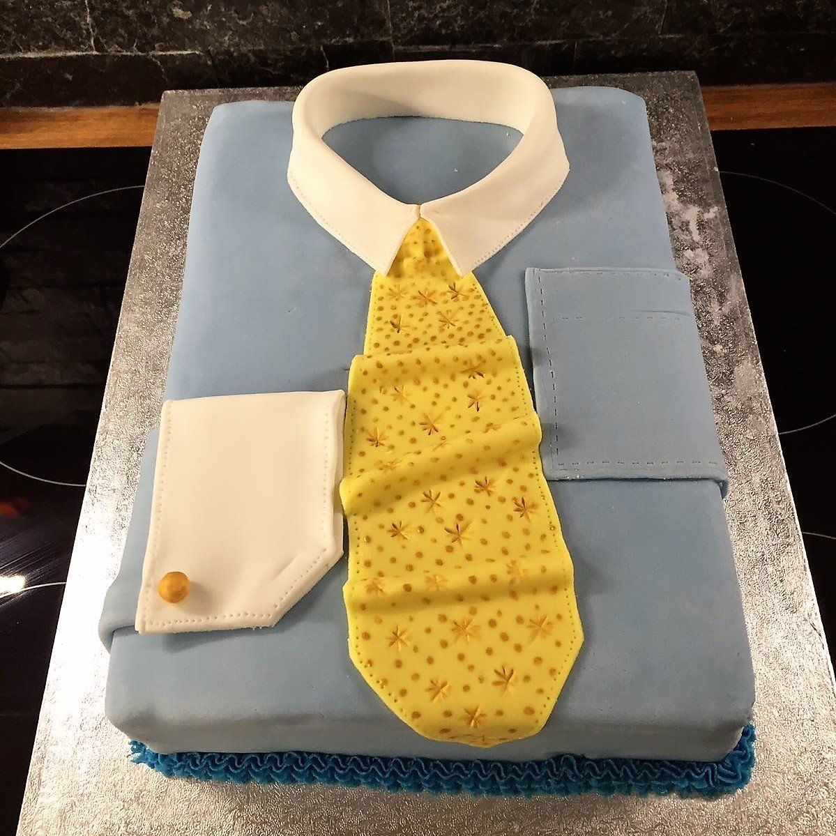 Blue shirt and yellow tie birthday cake