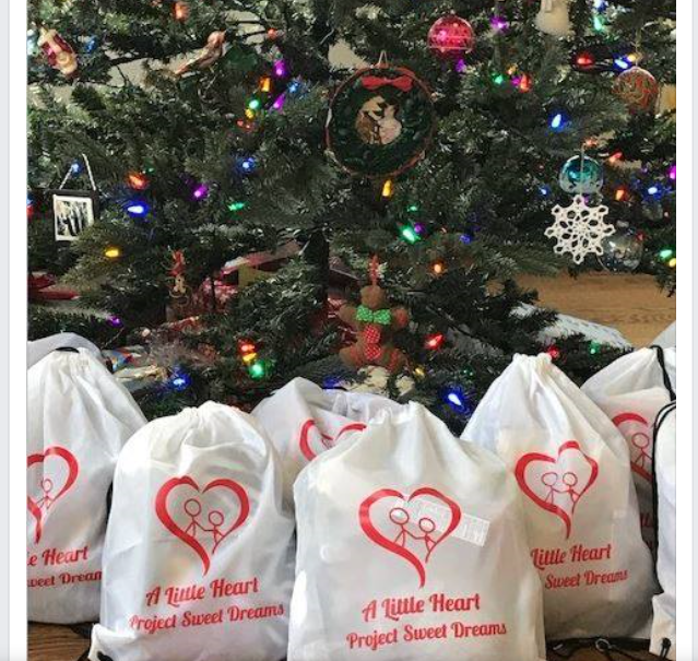 Sweet dreams bags under a Christmas tree