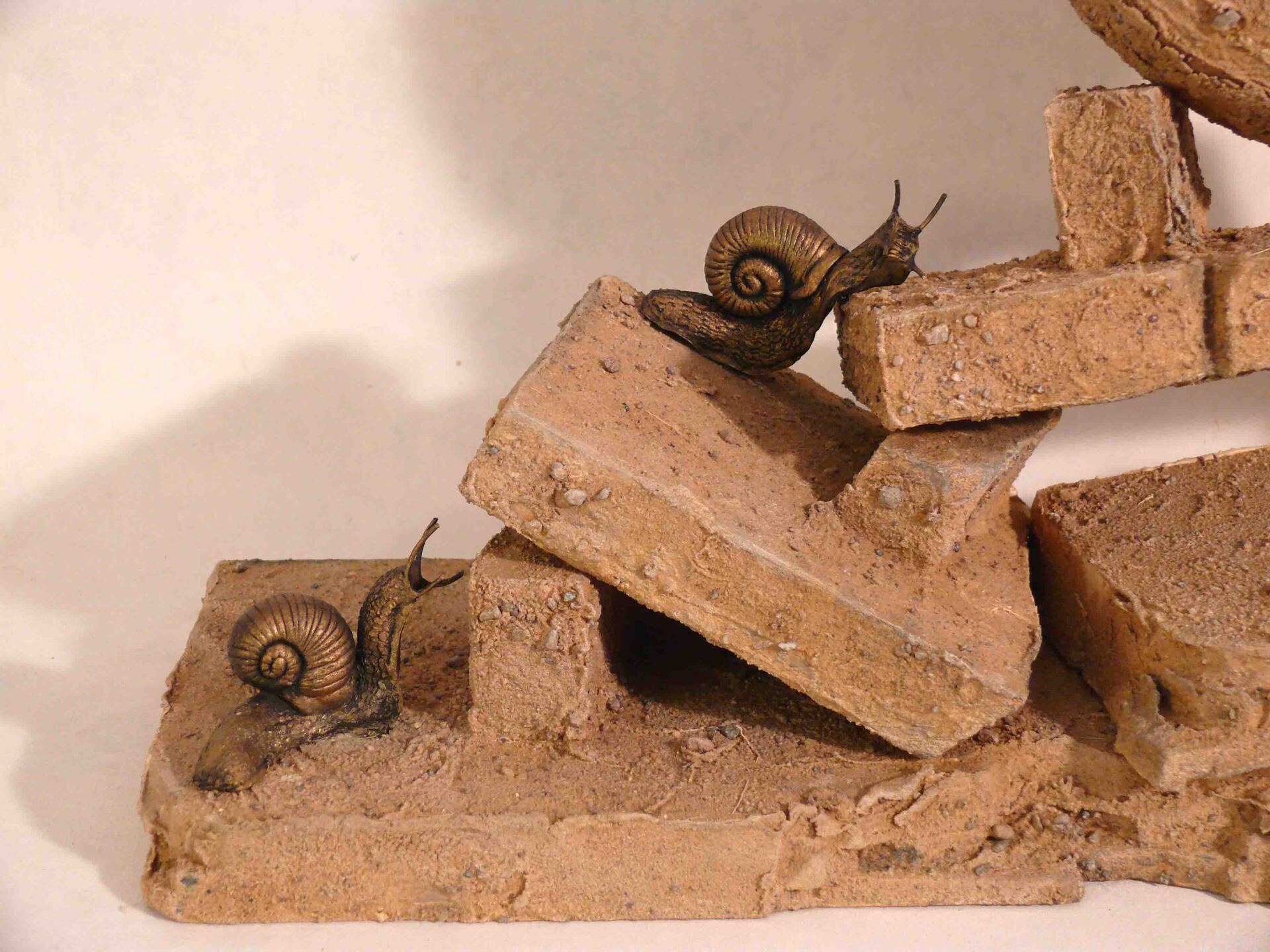 Kaminuhr mit Schnecken - linke Seite