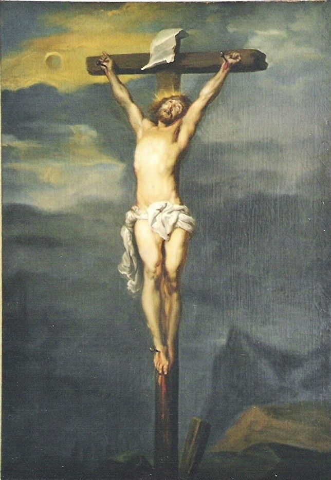 Jesus Christus, gekreuzigt an einem Holzkreuz vor einem bewölkten Himmel.