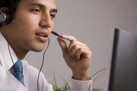 confident man speaking into headset