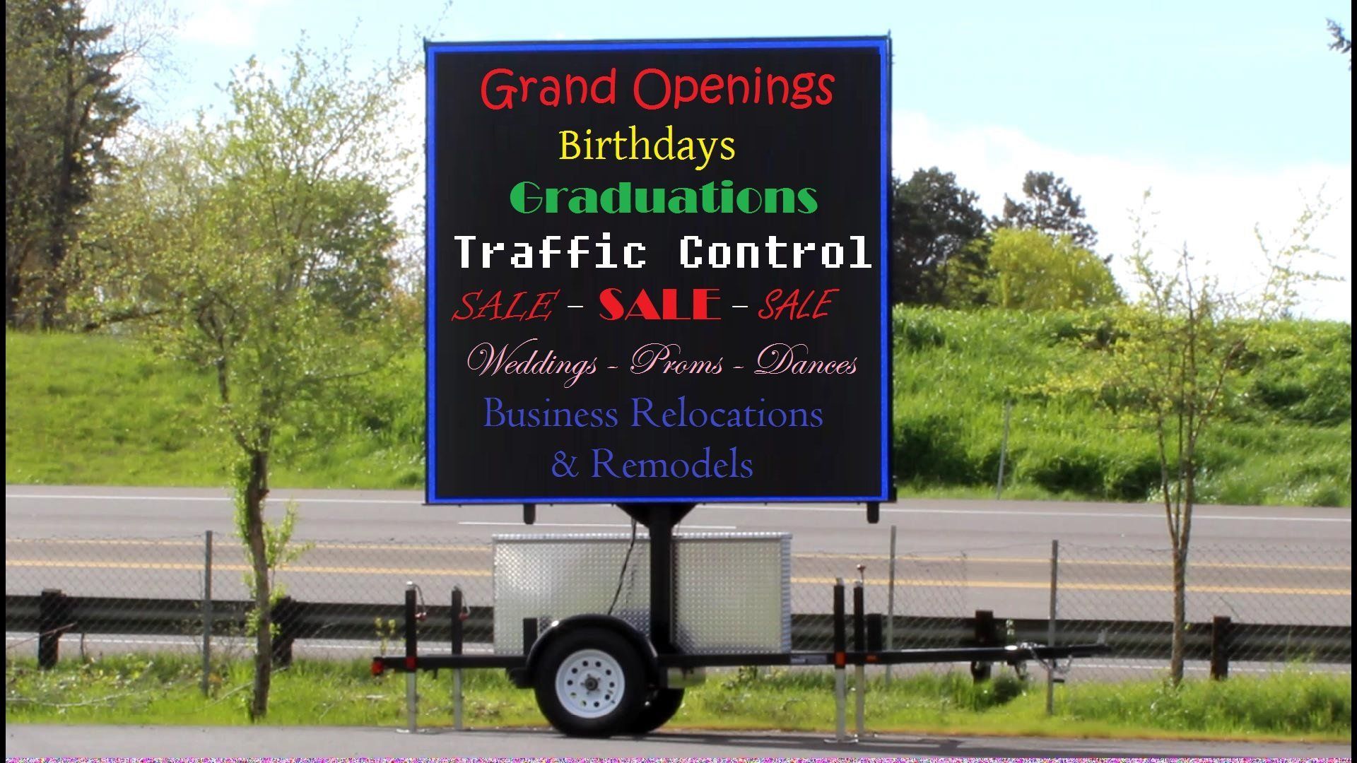 Sign reading Grand Openings, Birthdays, Graduations, Traffic Control, Sale - Sale - Sale, Weddings - Proms - Dances, Business Relocations & Remodels