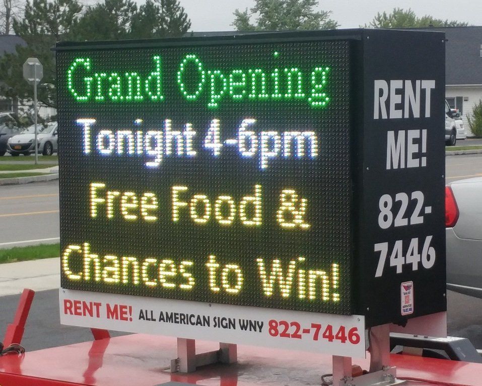color LED sign with Grand Opening message