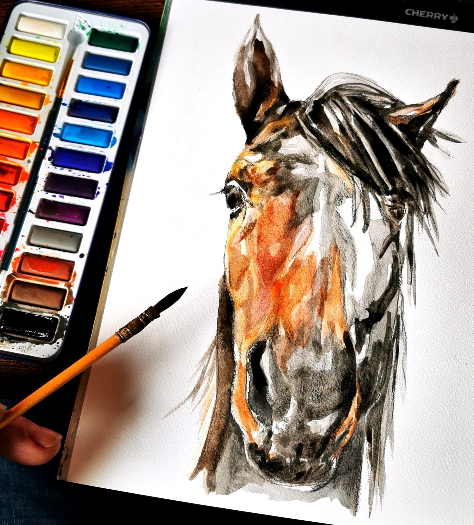 Foto zeigt eine Aquarellzeichnung Pferd