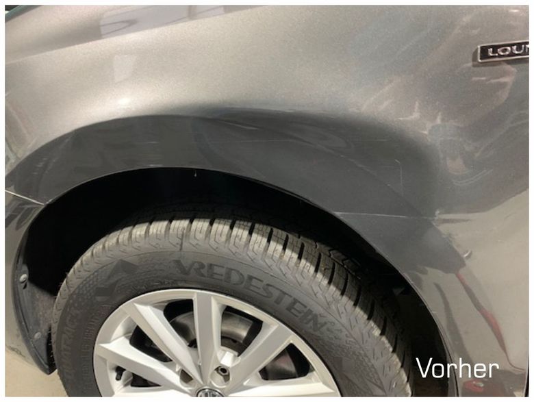 Delle im Kotflügel eines VW Polo