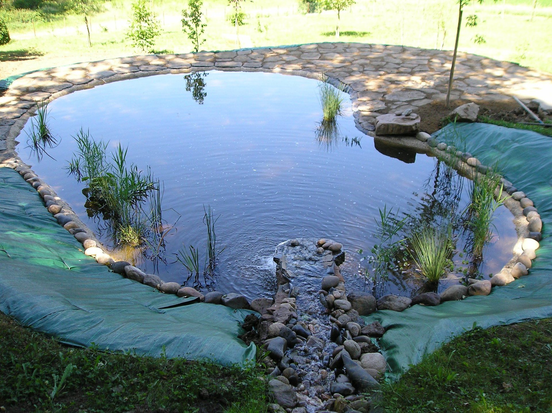 bassin en pierre, jardin zen, jardin exotique.....