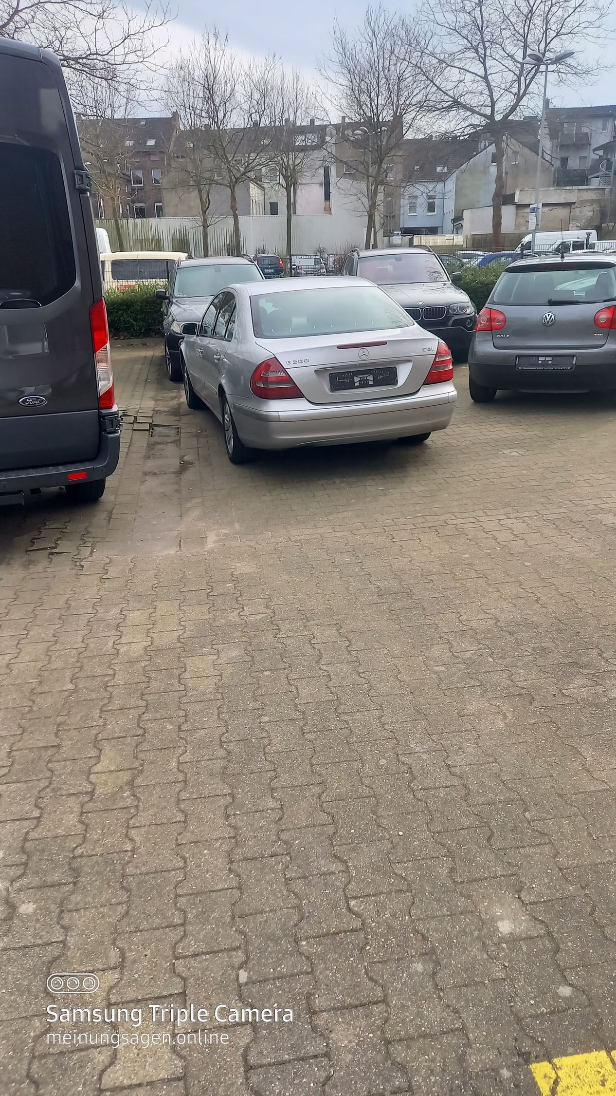 Mercedes Benz E200 CDI-Baujahr 2004 -Silber-Heck