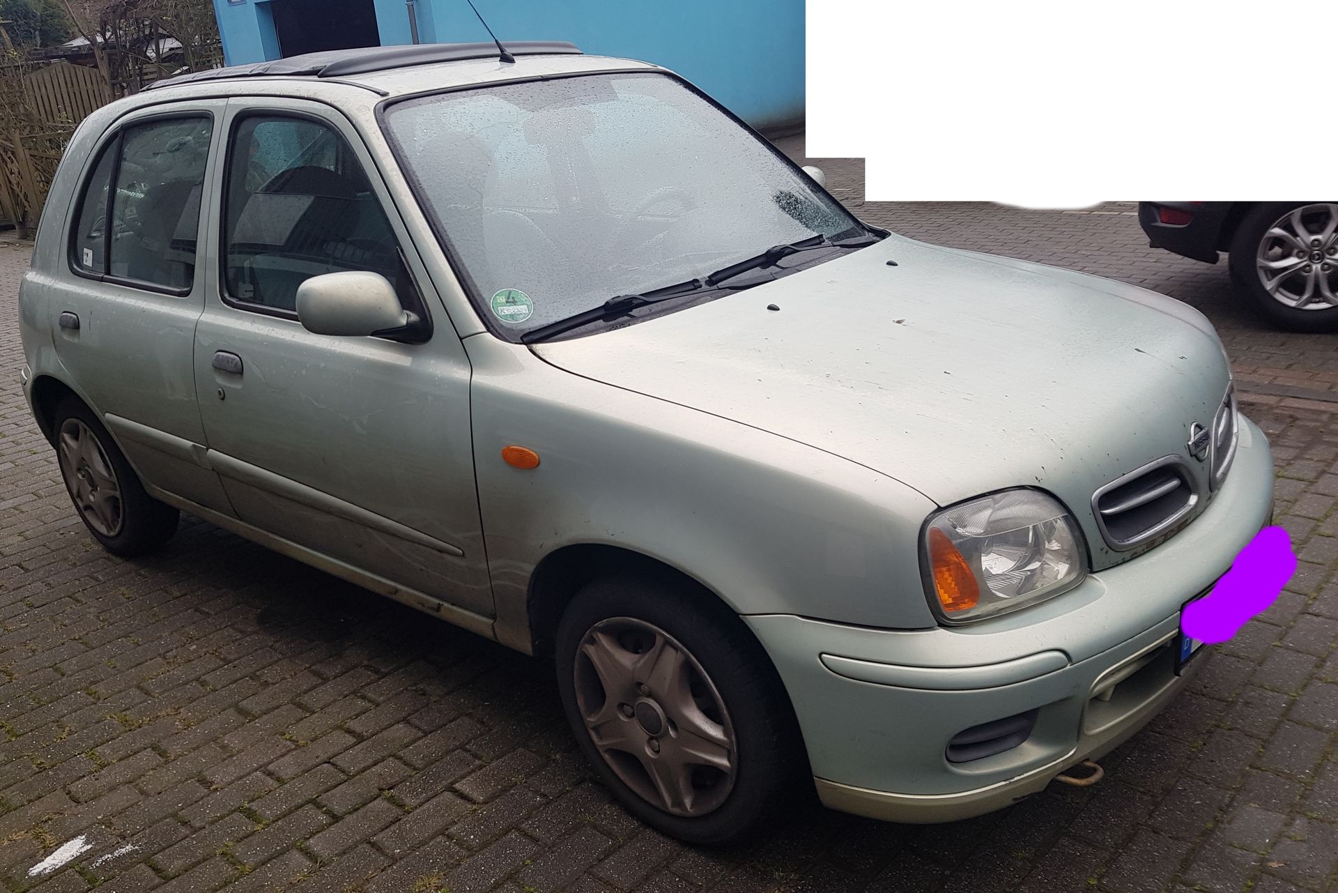Nissan Micra Baujahr 2001 Türer-Grün-Beifahrerseite