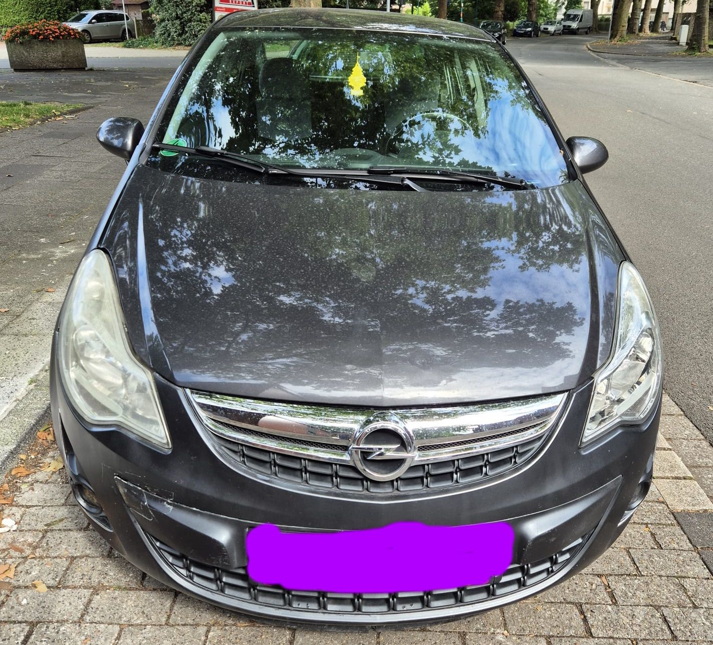 Opel Corsa-Baujahr 2011-Grau-Front-Stoßstage