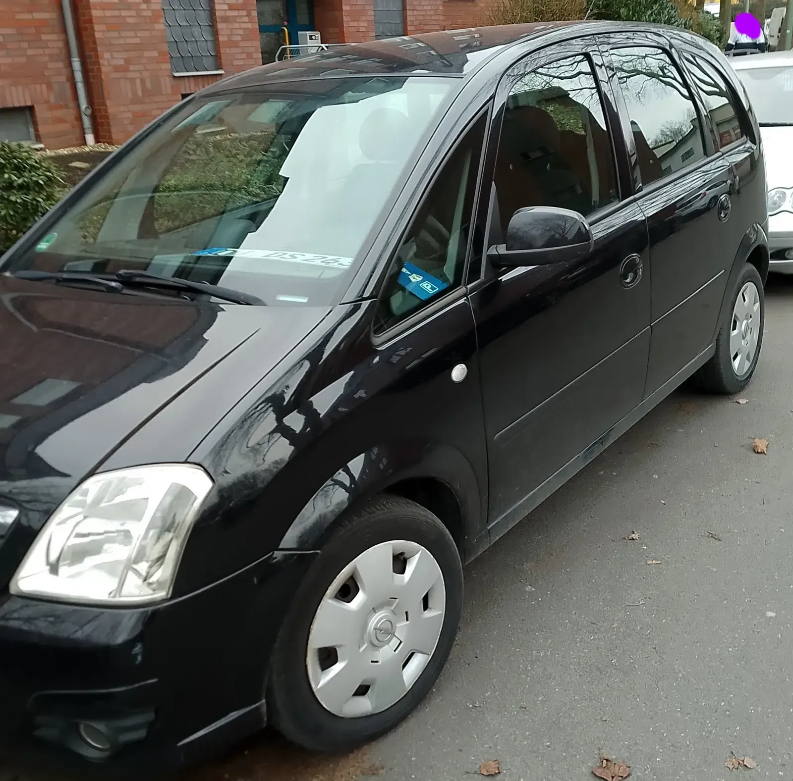 Opel Meriva Baujahr 2007-Schwarz-Fahrerseite