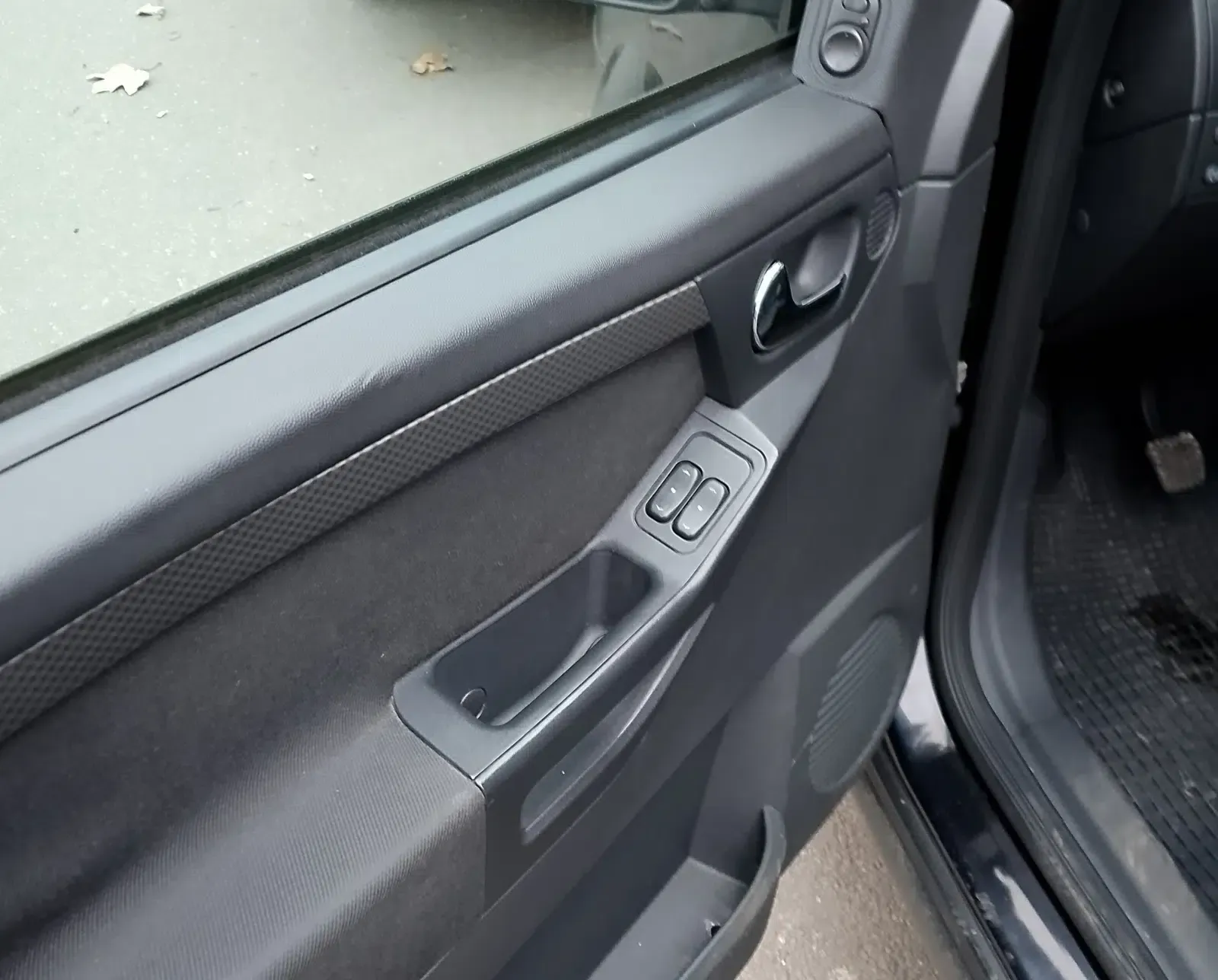 Opel Meriva Baujahr 2007-Schwarz-Fahrertür Offen