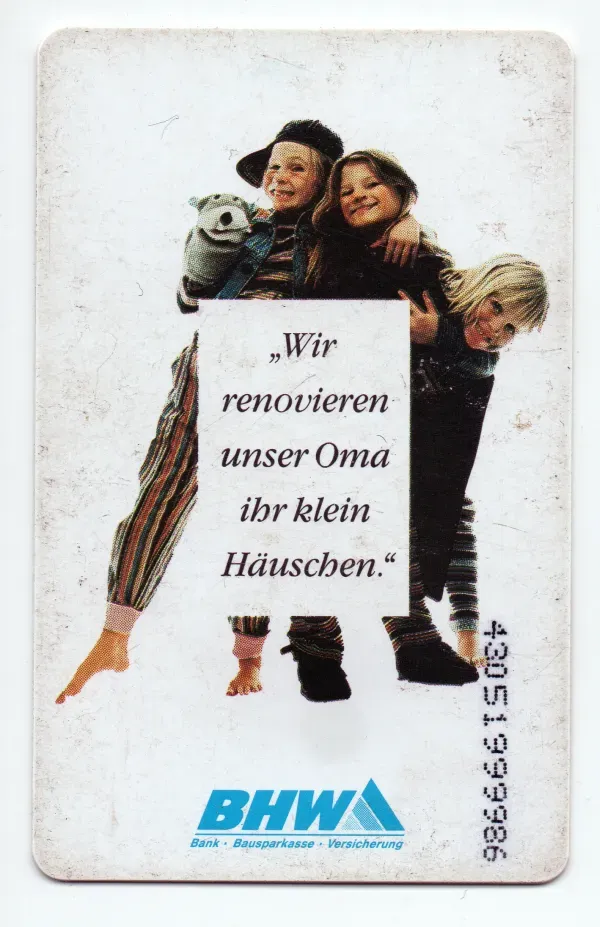 Telefonkarte 12 DM BHW Logo und drei lachenden Menschen.
