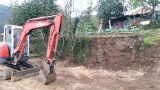 excavación y demolición excavadora derribo escombro tierra destierre